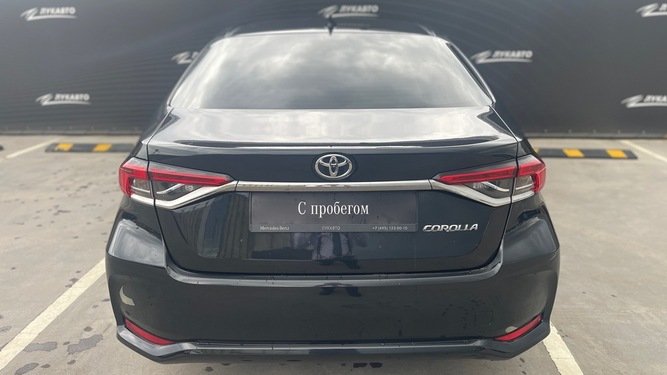Corolla, XII (E210)