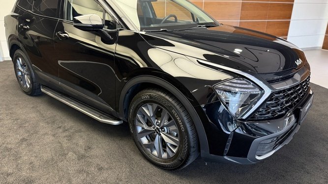 Sportage, V
